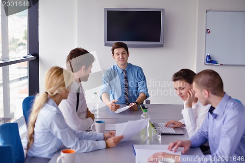 Image of business people in a meeting at office