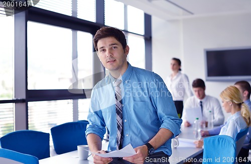 Image of business people in a meeting at office