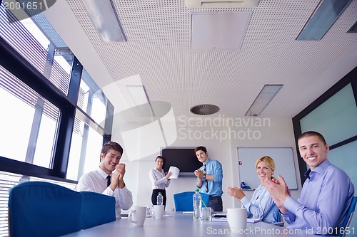 Image of business people in a meeting at office