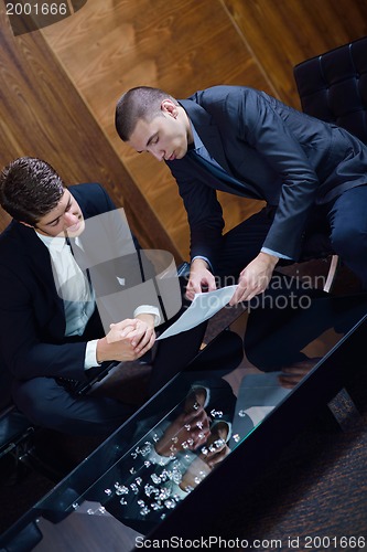 Image of business people making deal