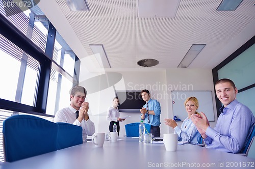 Image of business people in a meeting at office