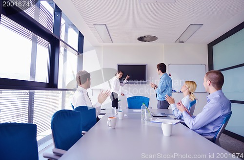 Image of business people in a meeting at office