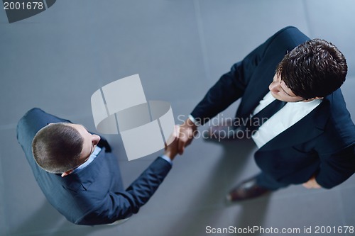 Image of business people making deal