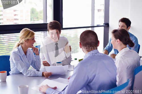 Image of business people in a meeting at office