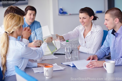 Image of business people in a meeting at office