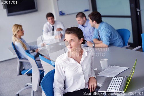 Image of business people in a meeting at office