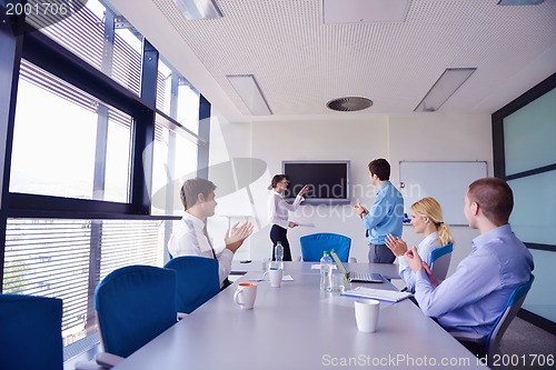 Image of business people in a meeting at office