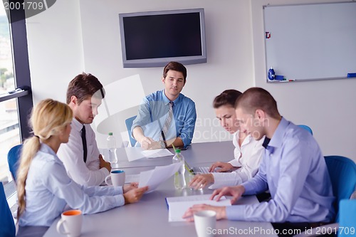 Image of business people in a meeting at office