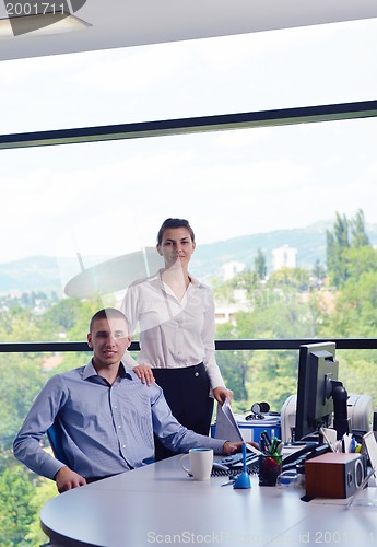 Image of business people in a meeting at office