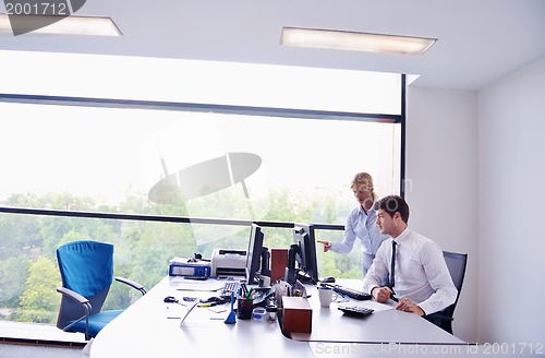 Image of business people in a meeting at office