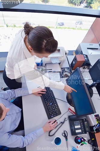 Image of business people in a meeting at office