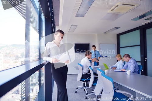 Image of business people in a meeting at office