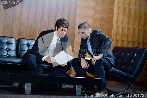 Image of business people making deal