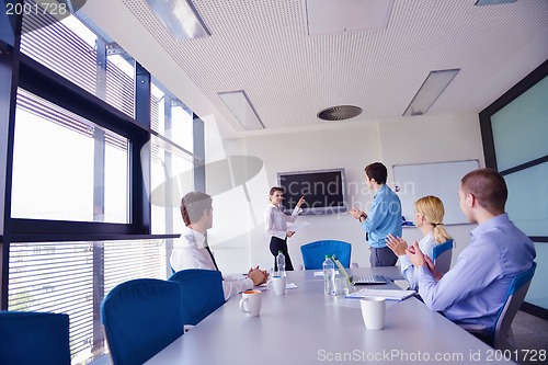 Image of business people in a meeting at office