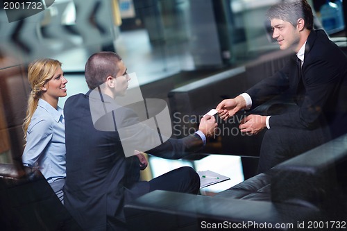 Image of business people making deal