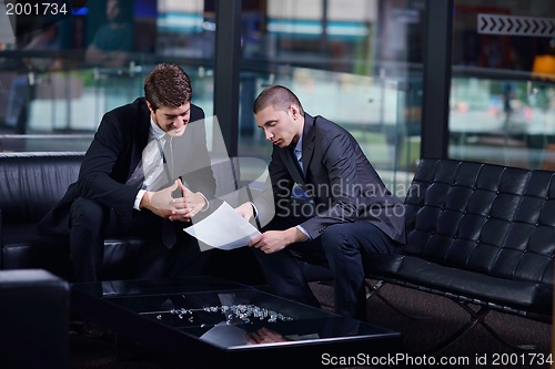 Image of business people making deal