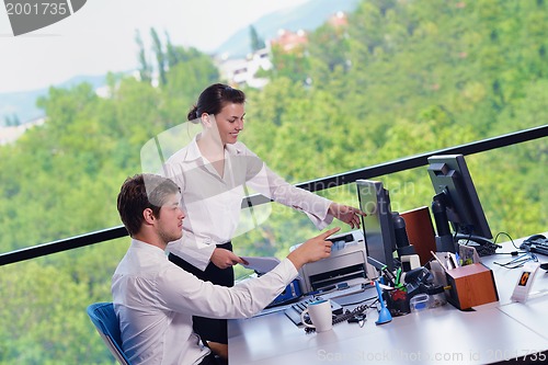 Image of business people in a meeting at office