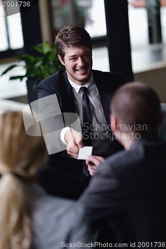 Image of business people making deal