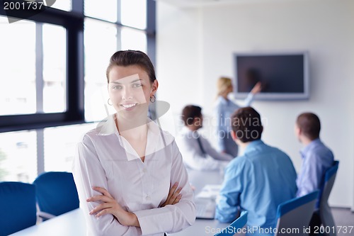 Image of business people in a meeting at office