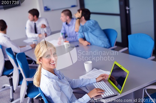 Image of business people in a meeting at office
