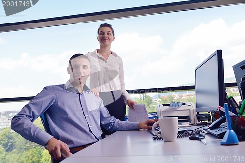 Image of business people in a meeting at office