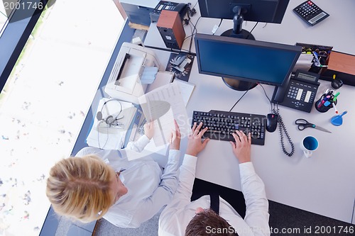 Image of business people in a meeting at office