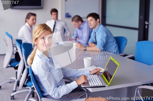 Image of business people in a meeting at office
