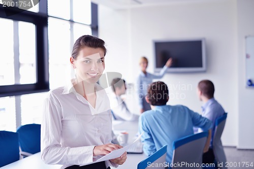 Image of business people in a meeting at office