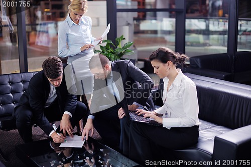 Image of business people making deal