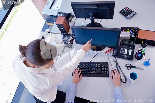 Image of business people in a meeting at office