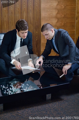 Image of business people making deal