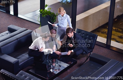 Image of business people making deal