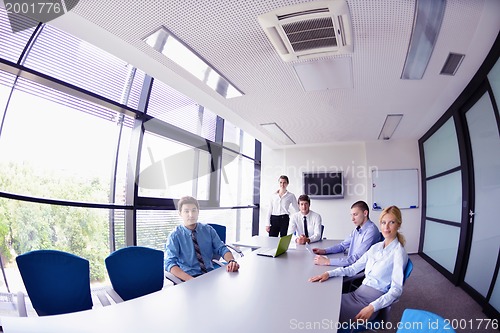 Image of business people in a meeting at office