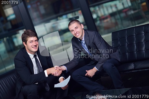 Image of business people making deal