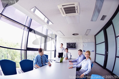 Image of business people in a meeting at office