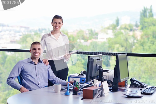 Image of business people in a meeting at office