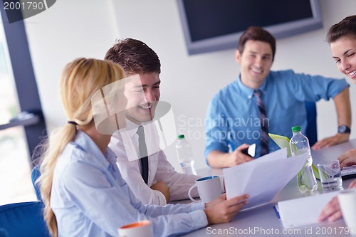 Image of business people in a meeting at office