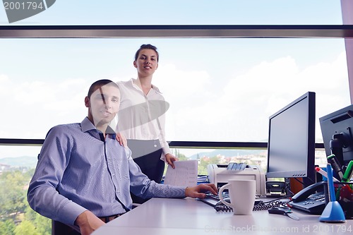 Image of business people in a meeting at office
