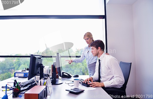 Image of business people in a meeting at office