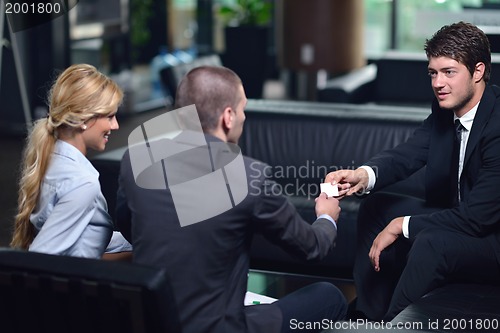 Image of business people making deal