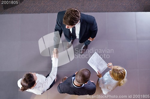 Image of business people making deal