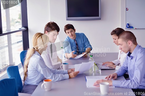Image of business people in a meeting at office