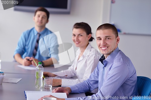 Image of business people in a meeting at office