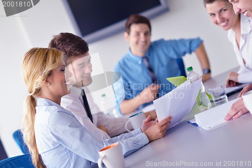 Image of business people in a meeting at office