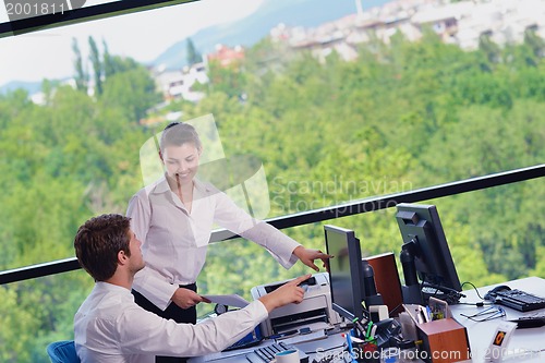 Image of business people in a meeting at office