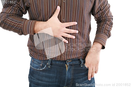 Image of man holding his stomach in pain or indigestion 