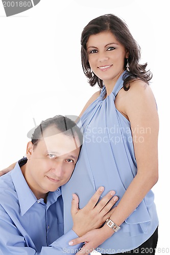 Image of Portrait of a happy young pregnant woman with her husband 