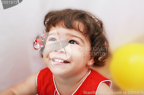 Image of Two years old girl expressing happy over white background 