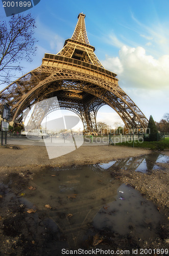 Image of Dramatic view of Eiffel Tower with Sky on Background