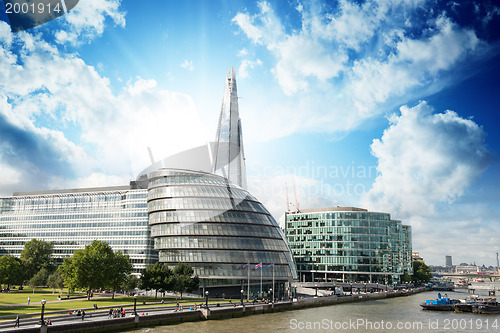 Image of New London city hall with Thames river and cloudy sky, panoramic